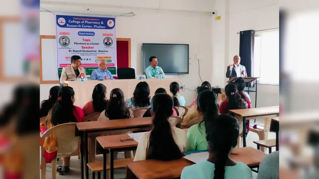 Pharmacy as a Career Guest Lecture at PES College of Pharmacy Phaltan 4 Dr. Nagesh Aloorkar guiding students about career opportunities in pharmacy