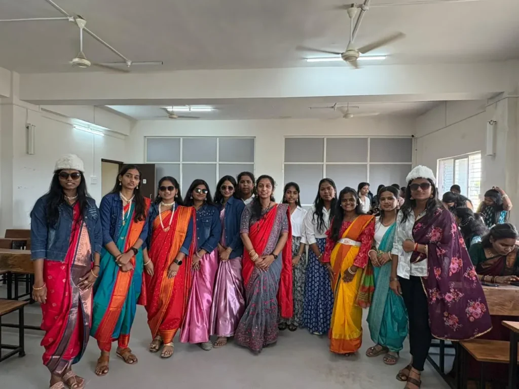Students showcasing traditional attire during Traditional Day 2026 at PES College of Pharmacy Phaltan