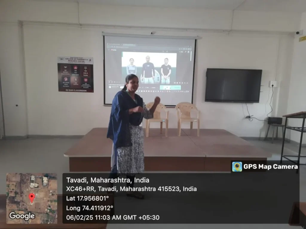 ICC Awareness Program 2025 at PES College of Pharmacy Phaltan 4 Prof Priya Kadam explaining self-defense and safety tips for girl students